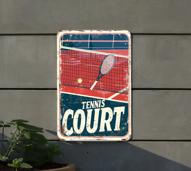 a tennis court sign hanging on the side of a building
