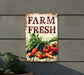 a sign that says farm fresh hanging on a wall