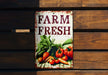 a sign on a wooden wall that says farm fresh
