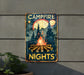 a campfire sign hanging on the side of a building