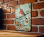 a picture of a bird on a brick wall