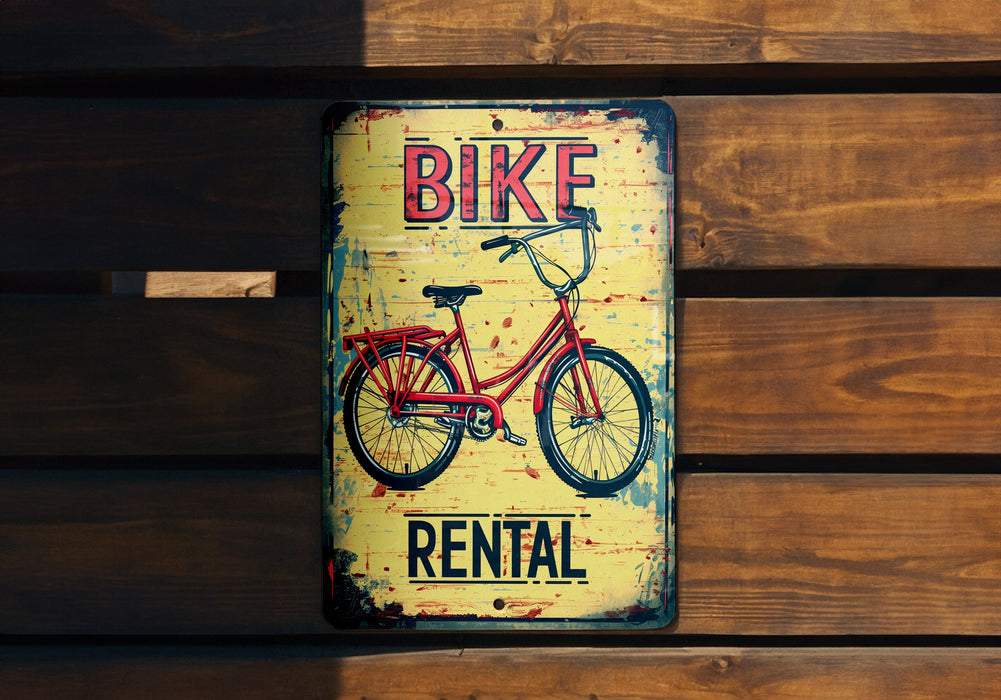 a bicycle rental sign on a wooden wall