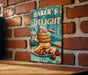 a sign on a brick wall that says baker's delight