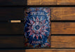 a book sitting on top of a wooden bench