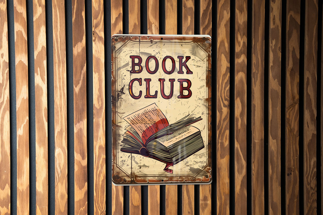 a book club sign hanging on a wooden wall