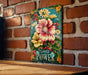 a picture of a flower on a brick wall