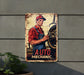 a vintage auto mechanic sign hanging on the side of a building