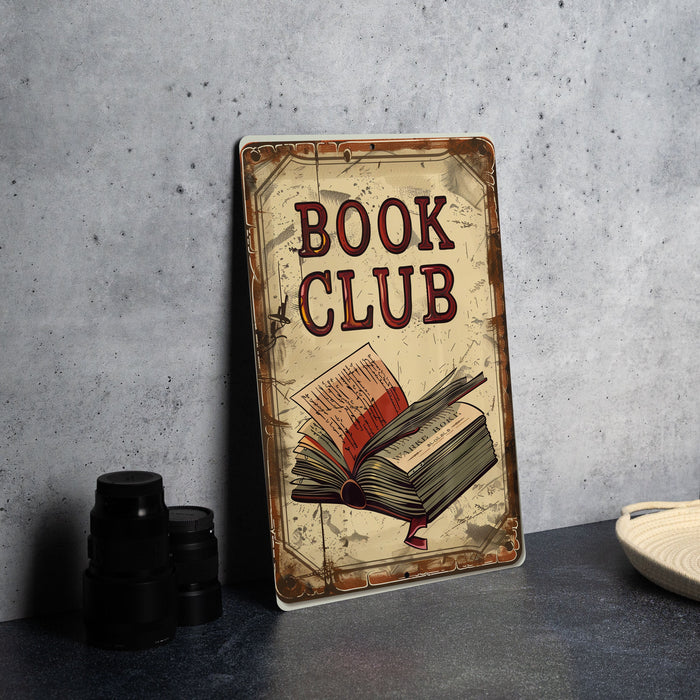 a book club sign sitting on top of a table