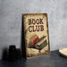 a book club sign sitting on top of a table