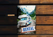 a sign on a wooden wall that says rental