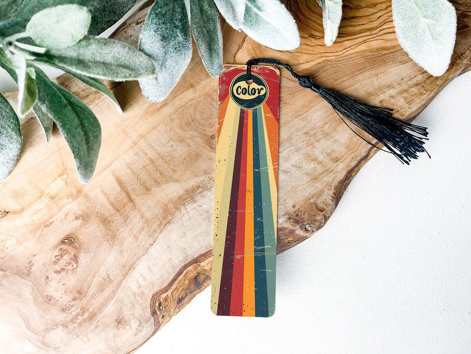 a piece of wood with a tassel hanging from it