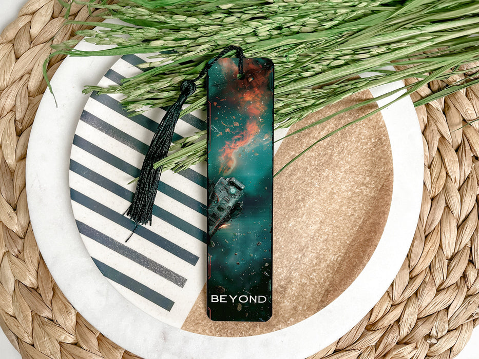 a green bookmark sitting on top of a white plate