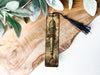 a bookmark with a picture of a man on it