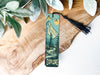 a bookmark with a picture of a mountain on it