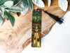 a bookmark with a picture of a city on it