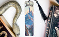 a bookmark with a picture of a snake on it