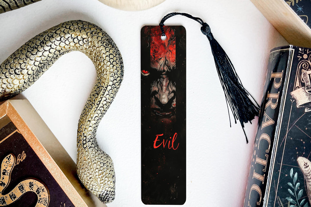 a bookmark with a picture of a demon on it