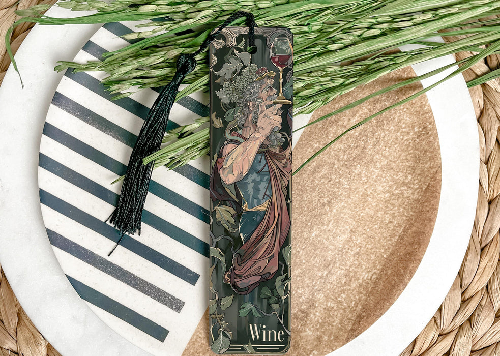 a bottle of wine sitting on top of a plate