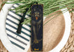 a bookmark with a picture of a wolf on it