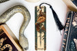 a bookmark with a snake and a snake on it