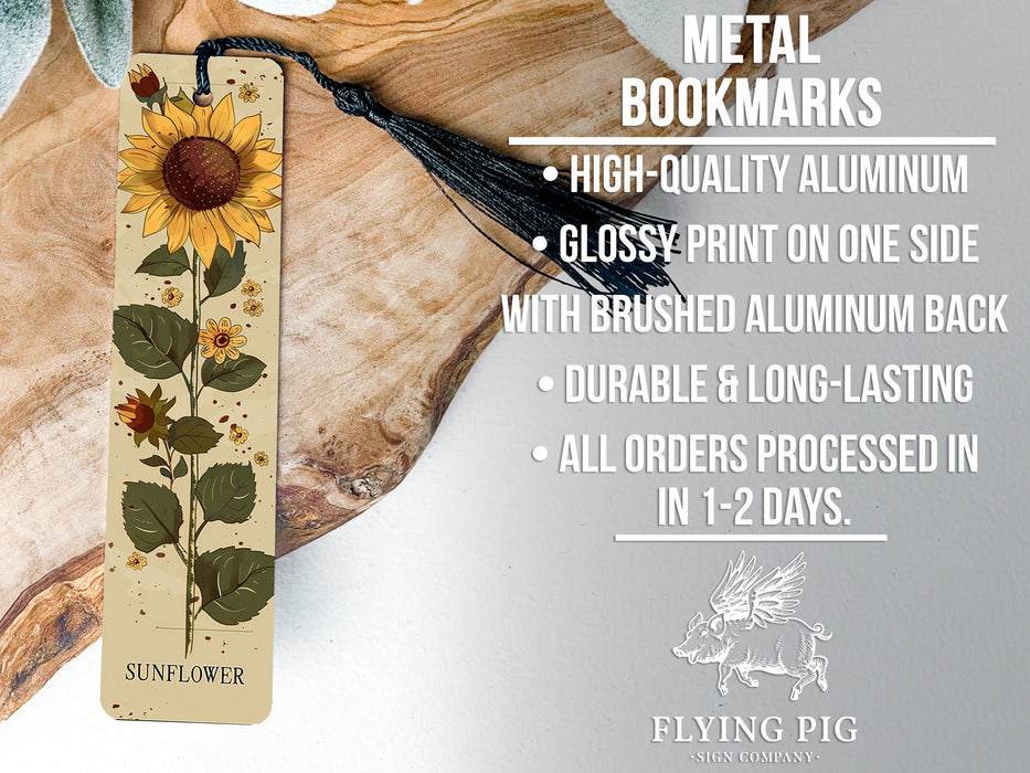 a metal bookmark with a sunflower on it