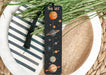 a bookmark with a picture of the solar system on it