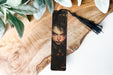 a bookmark with a picture of a woman's face on it