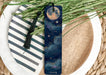 a bookmark with a moon and stars on it