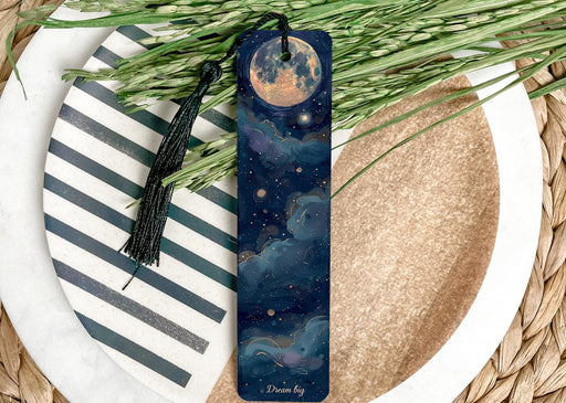 a bookmark with a moon and stars on it