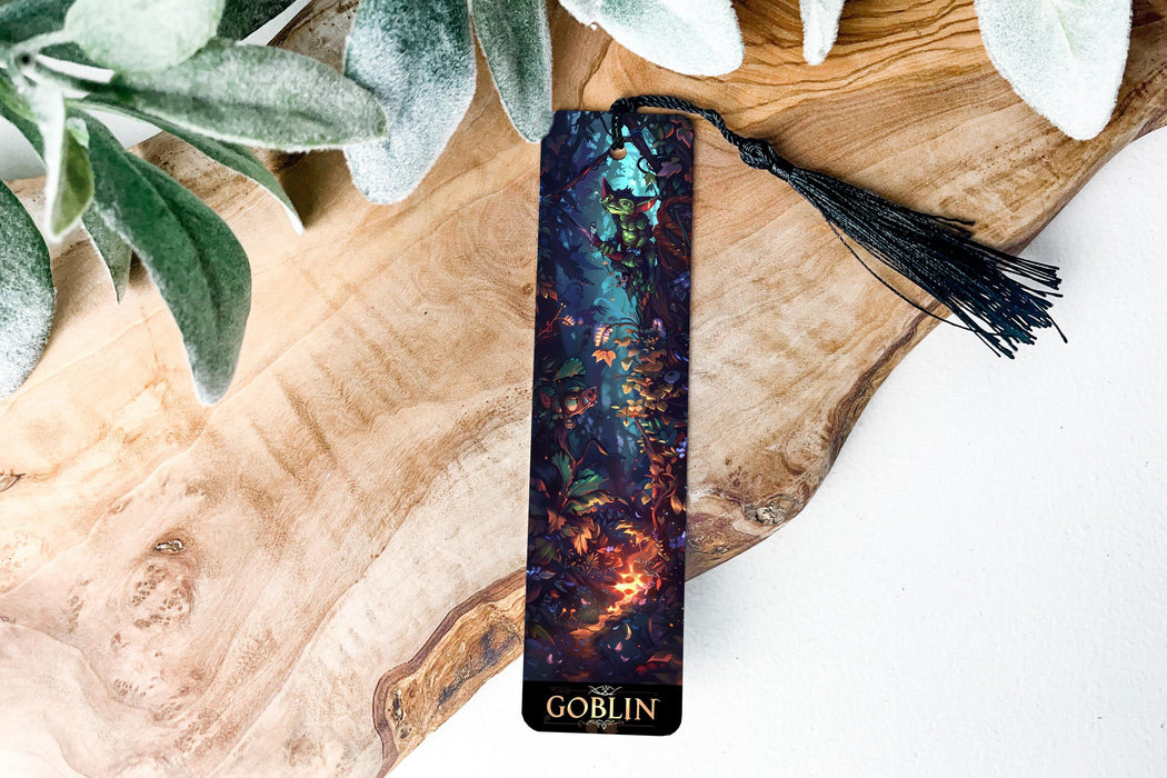 a bookmark with a picture of a forest on it