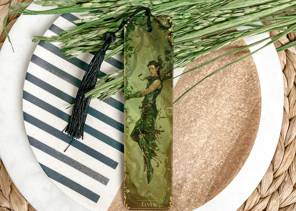 a green bookmark with a picture of a woman on it