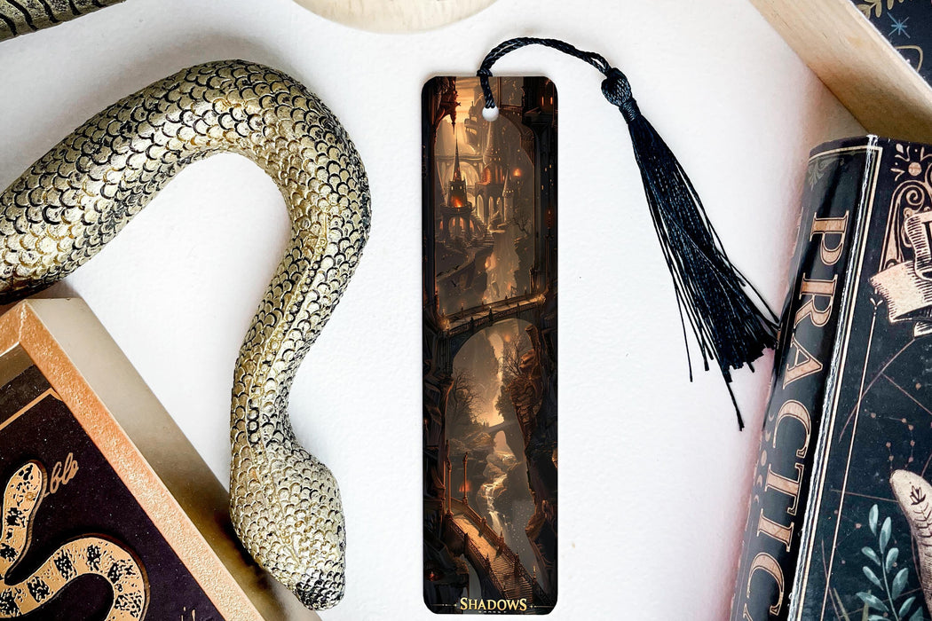a bookmark with a picture of a woman and a snake on it