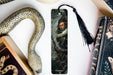 a bookmark with a picture of a man holding a gun