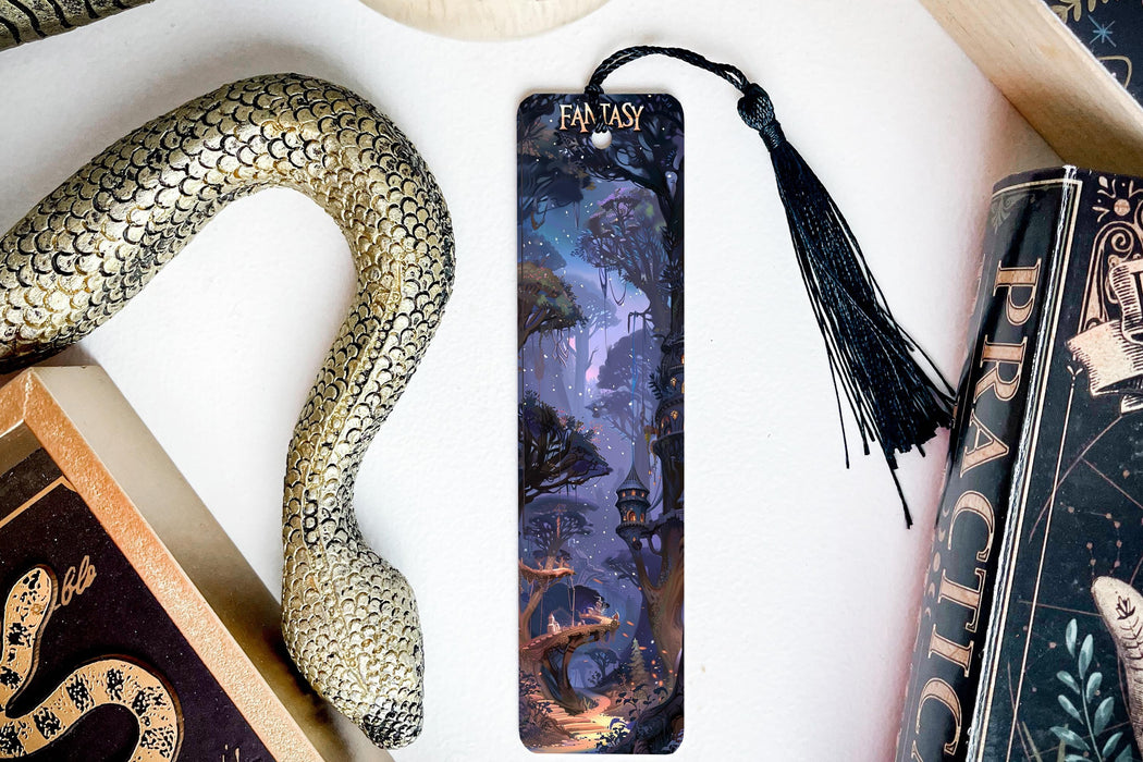 a bookmark with a picture of a forest on it