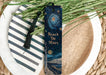 a bookmark with the words reach the stars on it