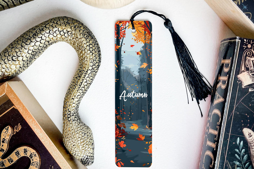 a bookmark with the name autumn written on it