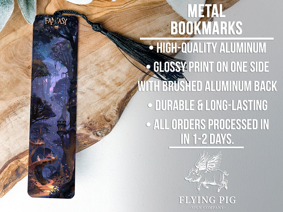 a metal bookmark with an image of a forest