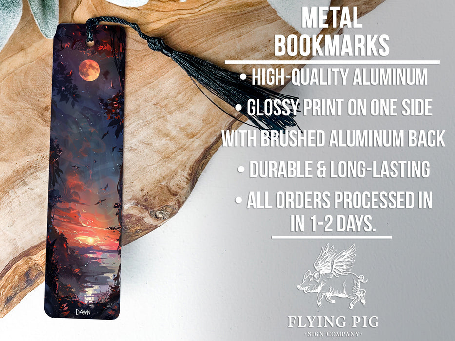 a metal bookmark with a painting of a sunset