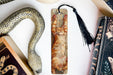 a bookmark with a picture of a cat on it