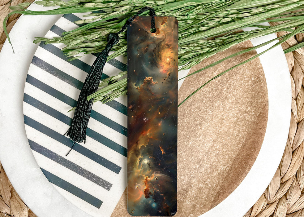 a bookmark sitting on top of a plate next to a plant