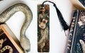 a bookmark with a picture of a woman and a snake on it