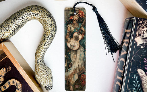 a bookmark with a picture of a woman and a snake on it