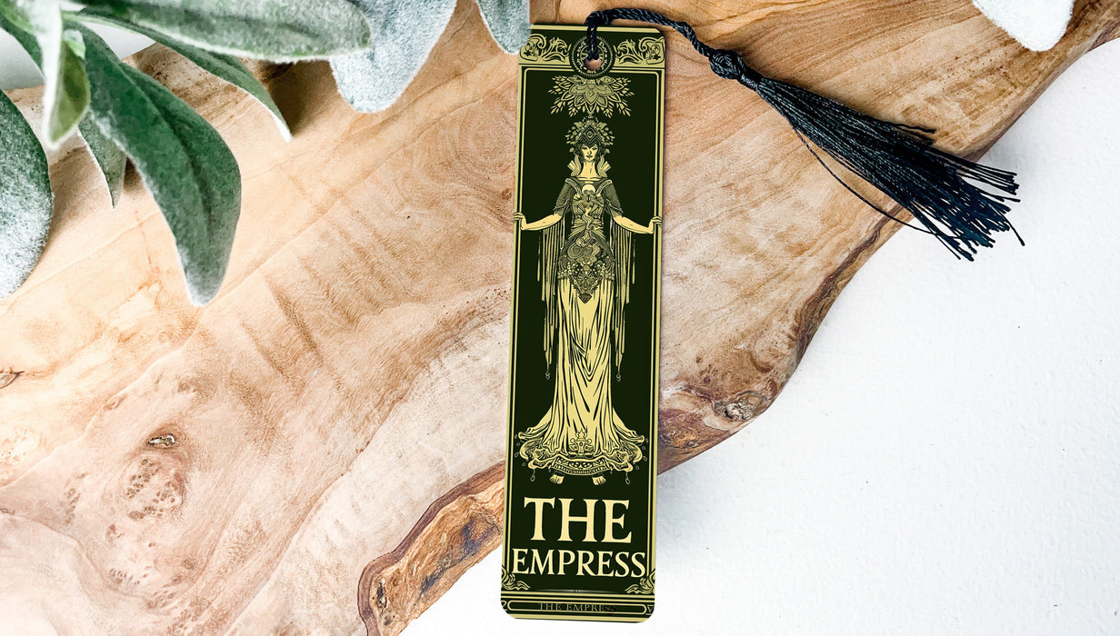 a bookmark with a tassel hanging from it