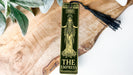 a bookmark with a tassel hanging from it