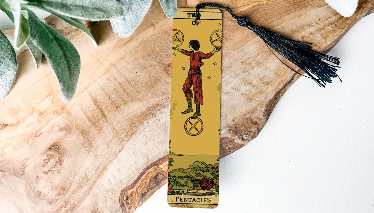 a wooden bookmark with a picture of a person on it
