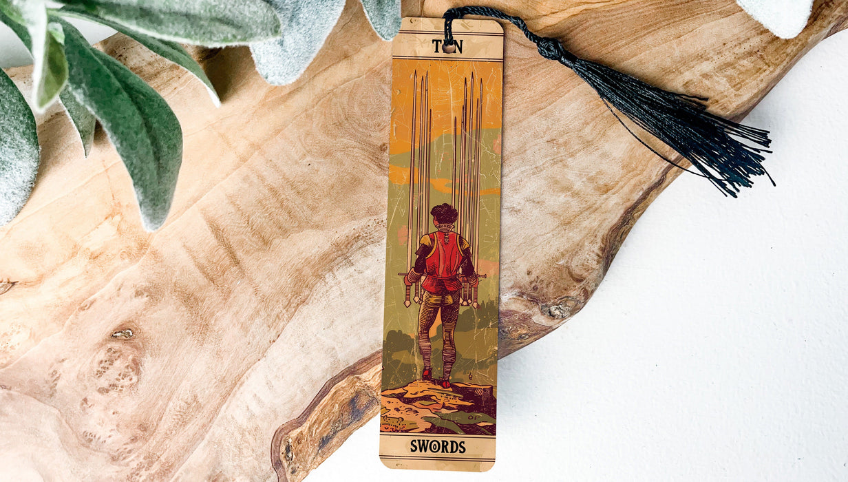 a wooden bookmark with a picture of a boy on it