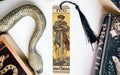 a snake, a tarot, and a tarot card on a table