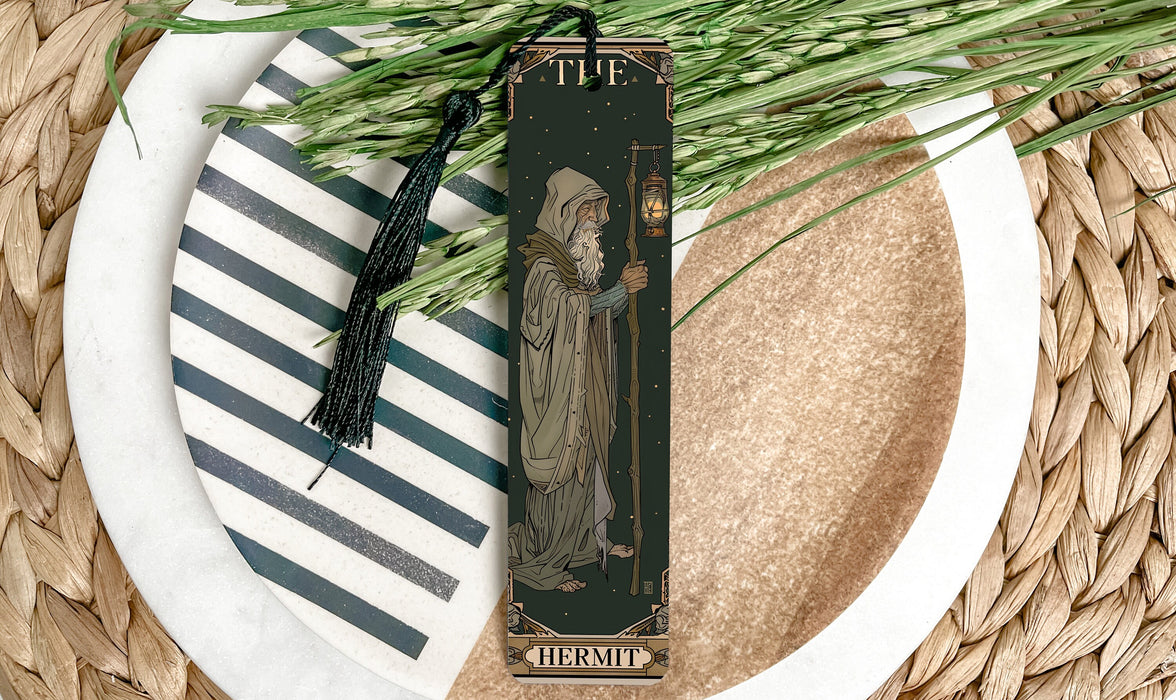a bookmark with a picture of a nun on it