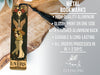 a metal bookmark with a picture of an angel on it