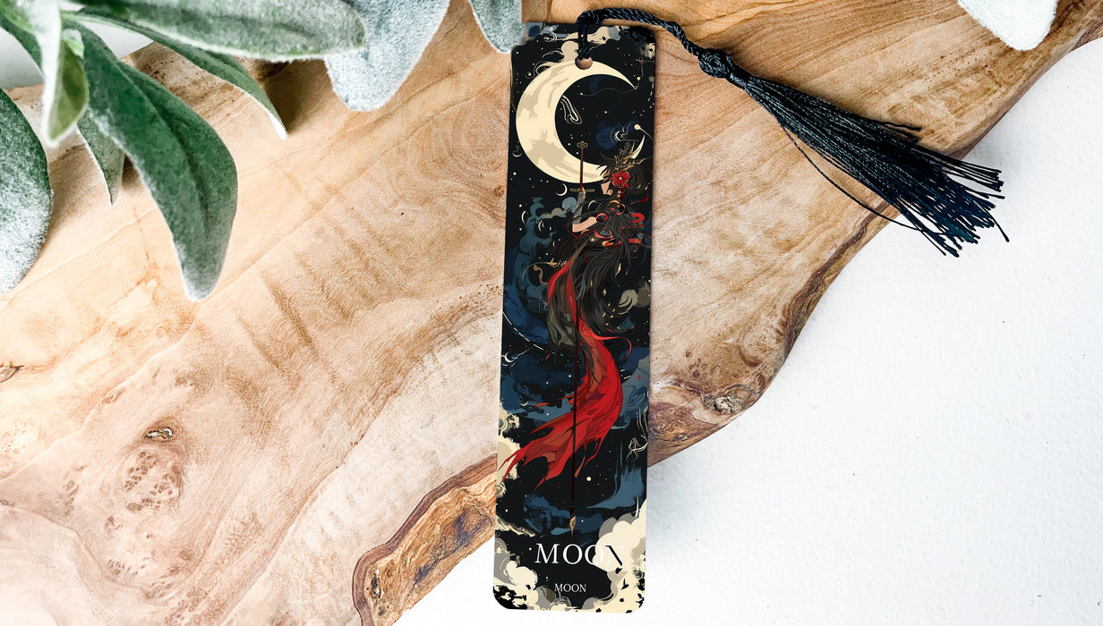 a wooden board with a tassel hanging from it